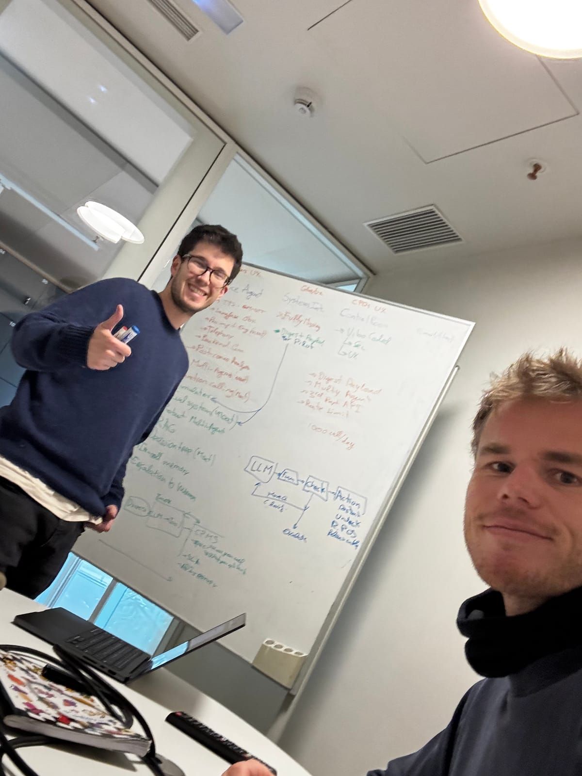 Nicholas and Arnaldo at the whiteboard